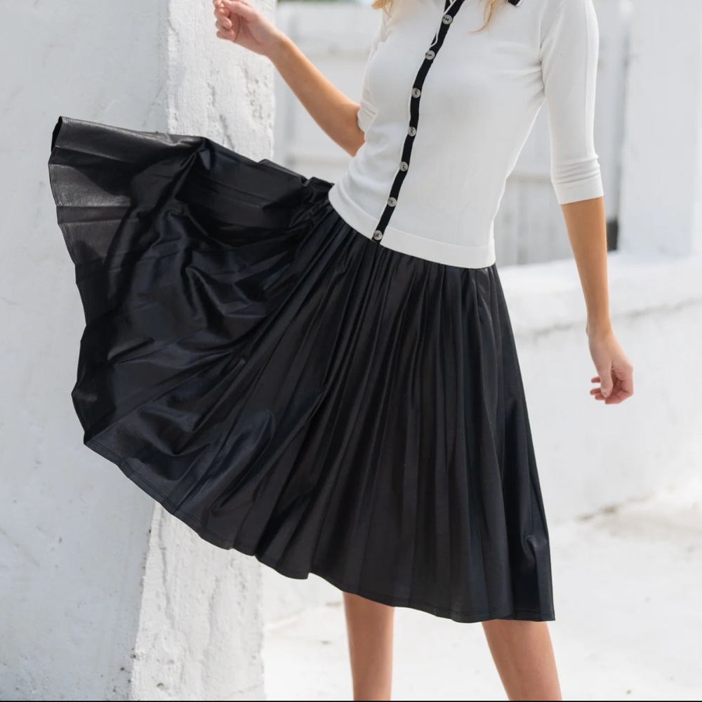 Pleated black leather skirt